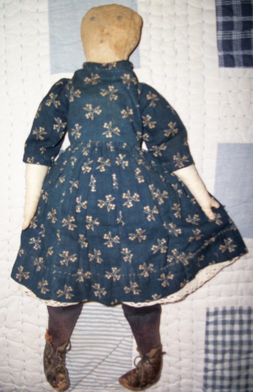 doll in blue dress